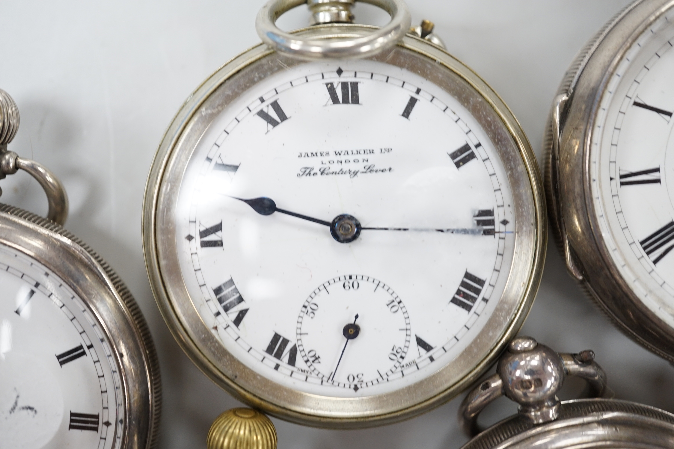 Thirteen assorted pocket and fob watches including silver Exchange and silver J.W. Benson.